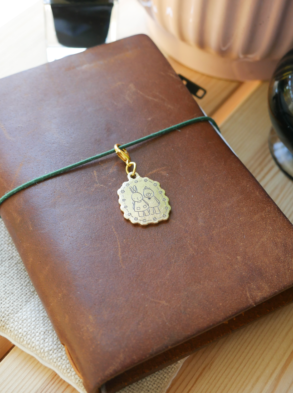 "always by your side" brass charm