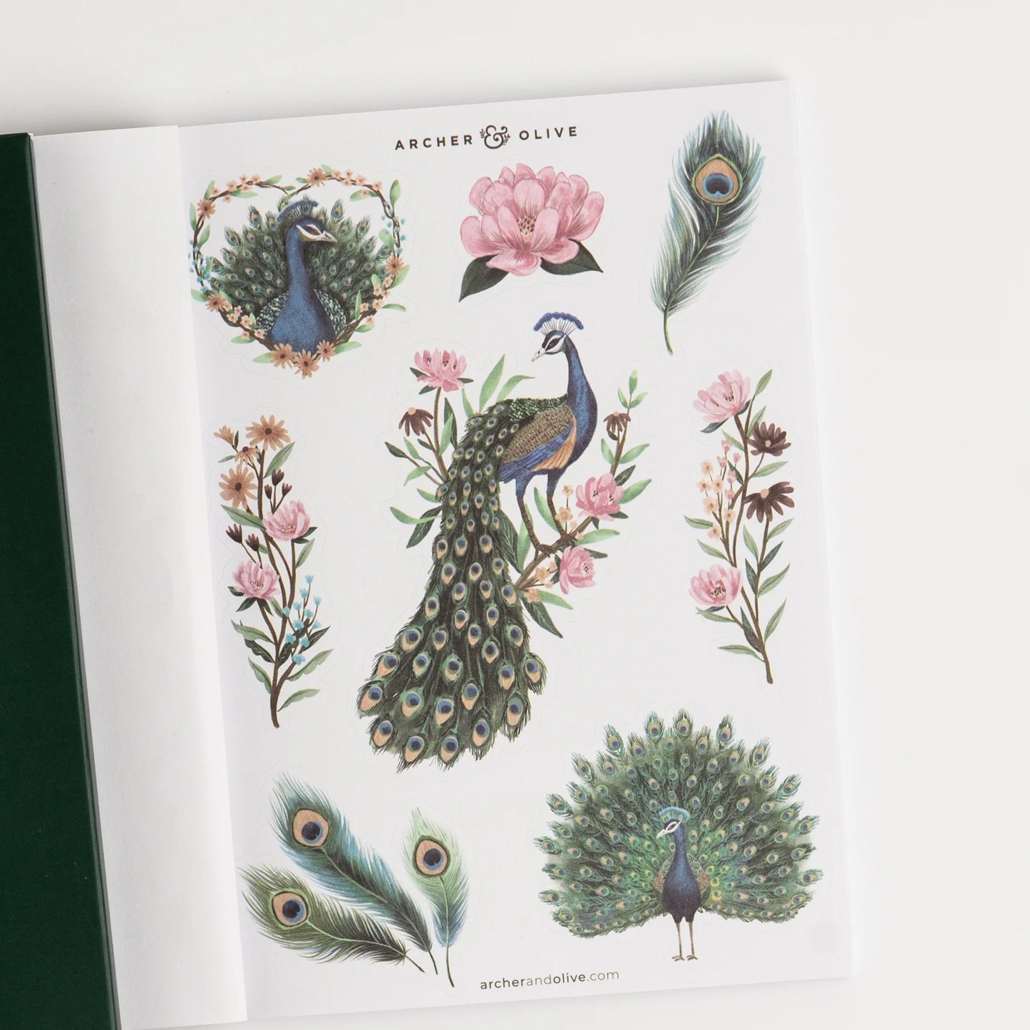 Sheet of peacock and floral temporary tattoos by Archer & Olive on a white background. This is a sheet in the Archer and Olive Sticker Favorites Pack Volume 1.