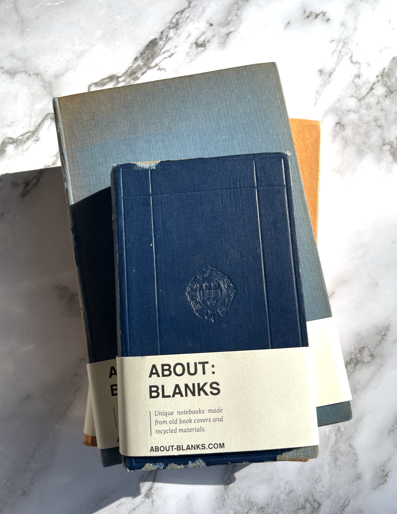 stack of journals with recycled book covers