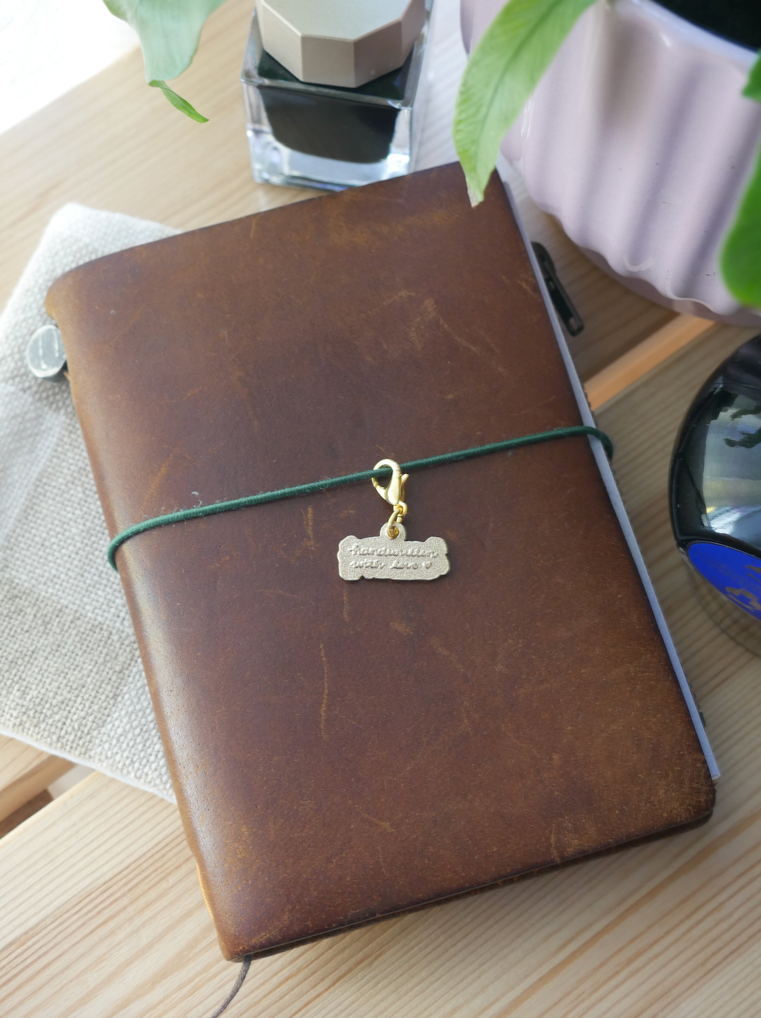 "handwritten with love" brass charm