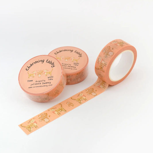 Washi tape in peach with a tabby cat wearing a bow and floral patterns
