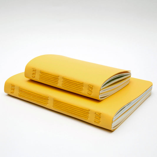 Yellow Handsewn Notebook with Assorted Paper