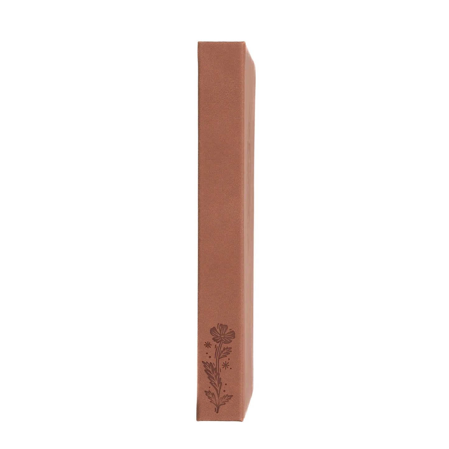 Archer and Olive spine of the Field Mouse notebook with embossed design of a flower on brown vegan leather. It's super cute and textural.