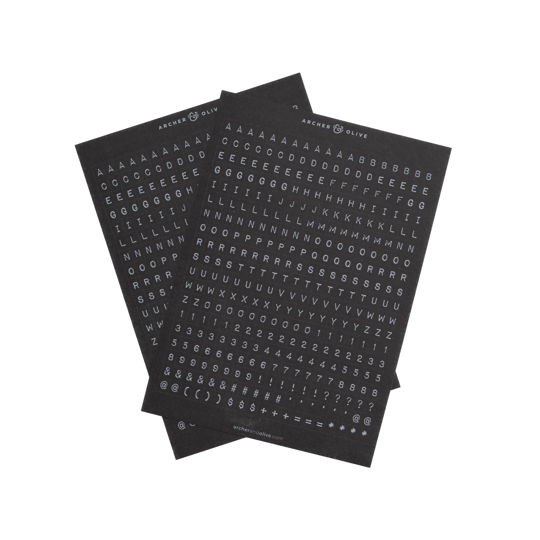 Page of sophisticated alphabet stickers, white letters on a black background. This image shows two sheets of stickers.