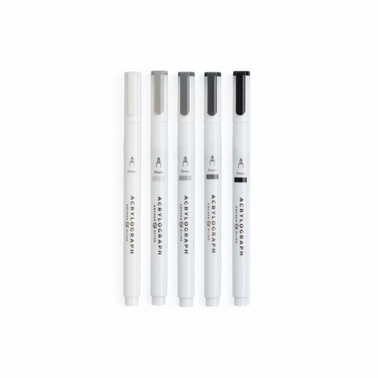 Archer and Olive Halloween 2025 Acrylograph grayscale pens Set of five white markers with black accents on a white background