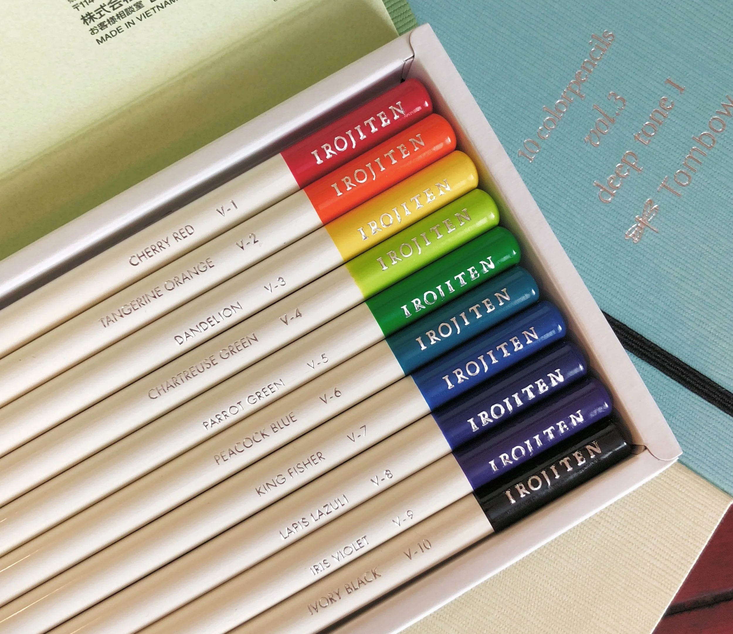 Set of colored pencils with visible brand name 'IROJITEN' in a box.