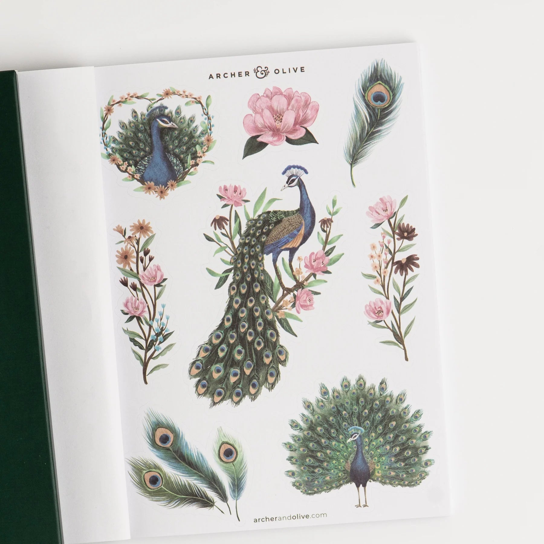 Sheet of peacock and floral temporary tattoos by Archer & Olive on a white background.  This is a sheet in the Archer and Olive Sticker Favorites Pack Volume 1.