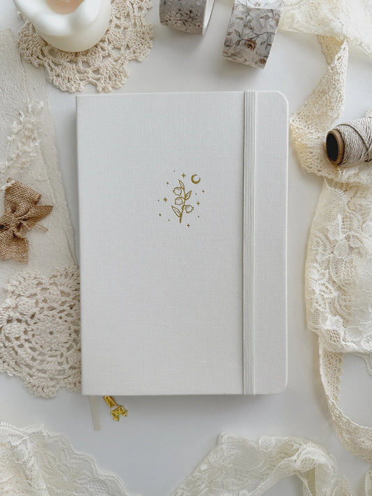 160 gsm | A5 | Lily of the Valley Notebook (Dotted)