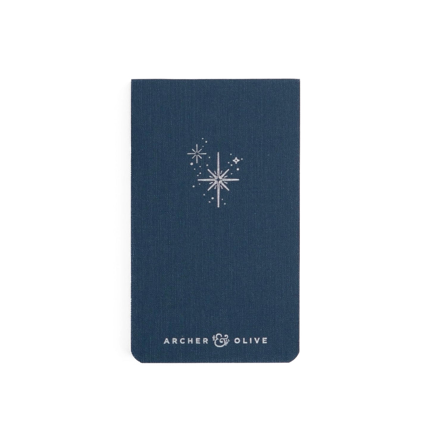 Small memo denim blue notebook with sparkle star design and Archer and Olive branding debossed in silver.